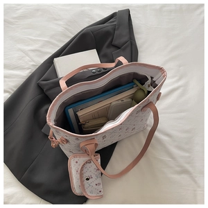 Detailed view of large Sanrio character print tote bag with small matching wallet set