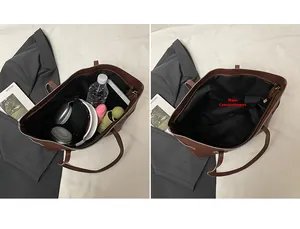 Macro detail showing large capacity of brown tote bag with various everyday essentials