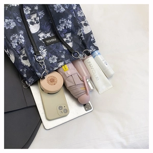 Top view of large tote bag showing high capacity for tablet, umbrella, and essentials