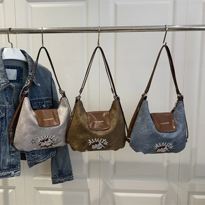 Retro canvas shoulder bags in grey, brown and blue with vintage embroidery and leather flaps