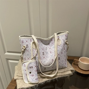 Chic cream tote bag with cartoon bear print and matching mini pouch for women