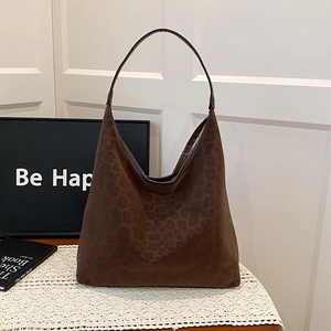 Minimalist deep brown leopard print hobo tote bag for women with suede texture and wide strap