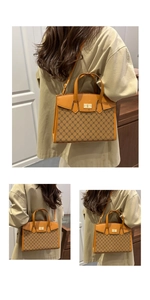 Detailed close-up of vintage monogram canvas and premium leather strap on shoulder bag