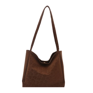 Minimalist large brown leopard print tote bag with shoulder straps and magnetic buckle