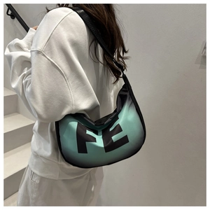 Detail of mint green gradient crossbody bag with bold black FE lettering and wide strap