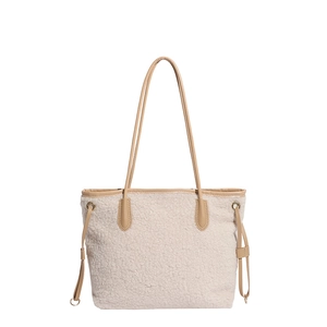 Chic autumn winter faux shearling tote bag with leather straps and drawstring detail