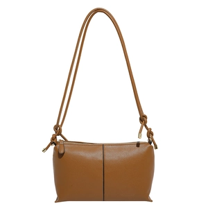 Brown lychee texture large capacity bucket tote bag with stylish knot shoulder strap detail