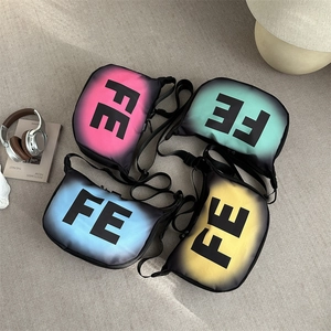 Waterproof dumpling crossbody bags in pink, teal, blue and yellow with FE logo