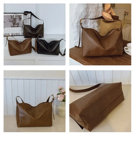 Detail view of large retro tote bags in coffee and black with adjustable straps