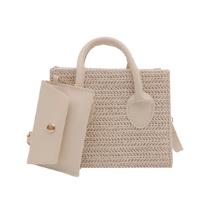 Vintage woven beige tote bag for women with round top handles and small coin purse charm