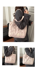 Detail of pink floral tote bag showing wide shoulder strap and functional side pocket
