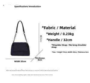 Detailed dimensions of quilted black fabric shoulder bag with chain strap and sizing guide