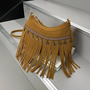 Bohemian tan suede tassel shoulder bag with ethnic embroidery and metallic charms