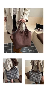Detail of large reversible tote bag showing brown suede and black white checkered patterns