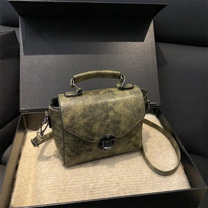 Chic moss green square handbag with vintage oil wax texture and metallic lock closure