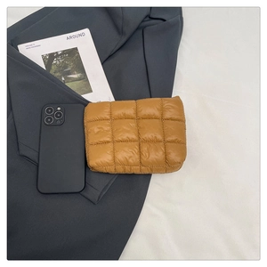 Brown quilted nylon pouch shown with a smartphone and a magazine for size reference