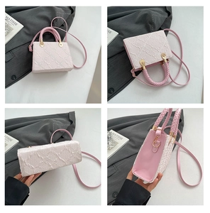 Detail view of pink woven texture handbag showing top, side and bottom perspectives