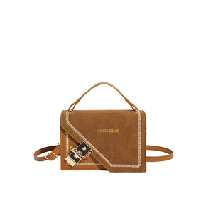 Brown vintage leather crossbody bag with suede flap and elegant metal lock closure