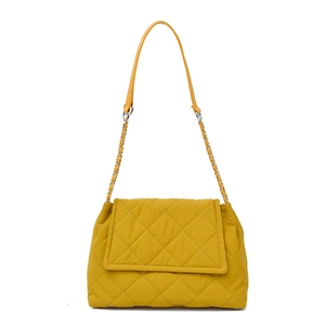 Yellow quilted shoulder bag with silver chain strap and puffy diamond stitching