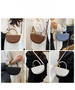 Collage of leather crescent saddle bags in four colors with gold circular ring handles