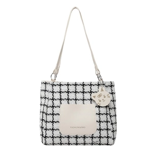 Chic houndstooth tweed tote bag with leather pocket and cute cartoon cat charm