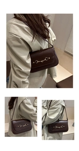 Detailed view of dark brown matte leather handbag featuring gold horsebit buckle accent