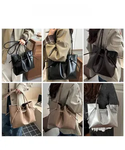 Diverse viste della grande borsa tote da donna portata a spalla e a mano