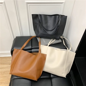 Minimalist large capacity tote bags in black, brown and beige colors, 2025 fashion collection