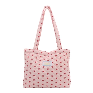 Pink quilted tote bag with red heart patterns and long shoulder straps for daily use