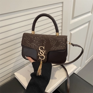 Deep brown leather crossbody bag with snake print flap and gold SS metal logo detail