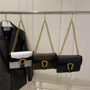 Chic monogram crossbody bags with vintage gold buckle in white, coffee, and black