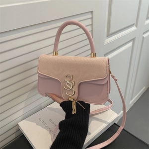 Chic light pink crossbody bag with snakeskin texture flap and golden S-shaped buckle