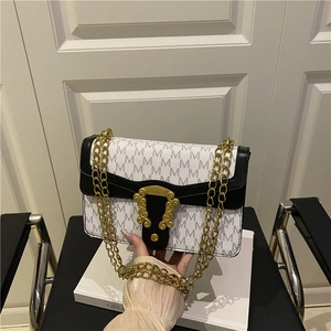 Retro flap shoulder bag with grey M print, white-black patchwork and gold chain strap