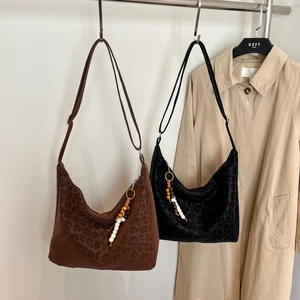 Retro leopard print hobo bags in dark brown and black with chic beaded pendant details