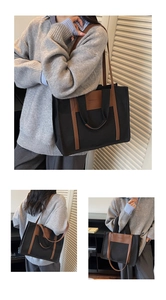 Detail of a large canvas tote bag with black and brown leather stitching for commuting