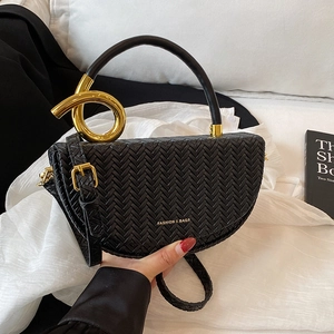 Chic black woven crescent handbag with gold hardware and versatile crossbody strap