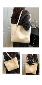 Détails du sac fourre-tout en cuir crème avec coutures fines et finitions dorées