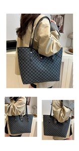 Detail view of large tote bag with M-letter pattern and silver studded leather straps