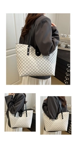 Close-up of tote bag with M-pattern print, black straps and magnetic closure detail