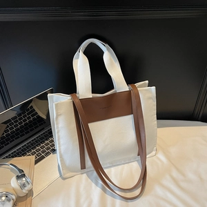 Large casual patchwork tote bag with white canvas and brown leather shoulder straps