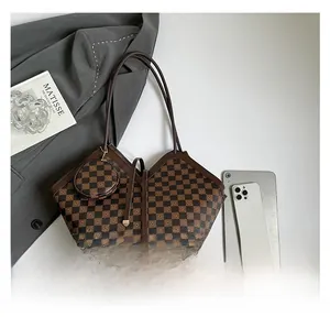 Flat lay of retro checkerboard tote bag set with mini coin purse and tablet for scale