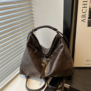 Retro dark brown leather hobo bag with adjustable straps and metal hook hardware