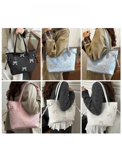 Collage of four bow-accented tote bags in black, pink, white, and blue shown on a model