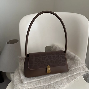 Retro brown baguette bag with leopard print panel and vintage brass clasp for women