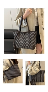 Detail view of large tote bag featuring classic Y-pattern and matching pouch accessory