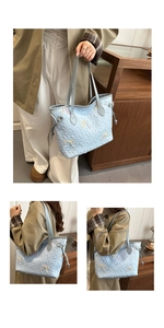 Close-up of light blue quilted tote bag with embroidered bows and drawstring detail