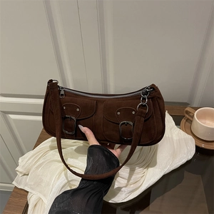 Retro dark brown suede crescent shoulder bag with twin buckle pockets and chain detail