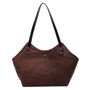 Brown faux suede tote bag with retro quilted pattern and spacious interior design