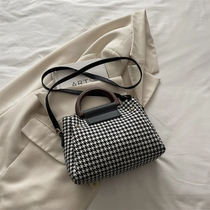 Classic houndstooth handbag with wooden handle and black leather trim for women