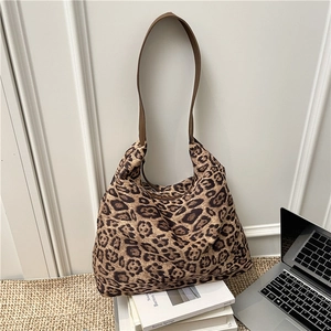Sac fourre-tout vintage à imprimé léopard avec bandoulières en cuir marron pour femmes